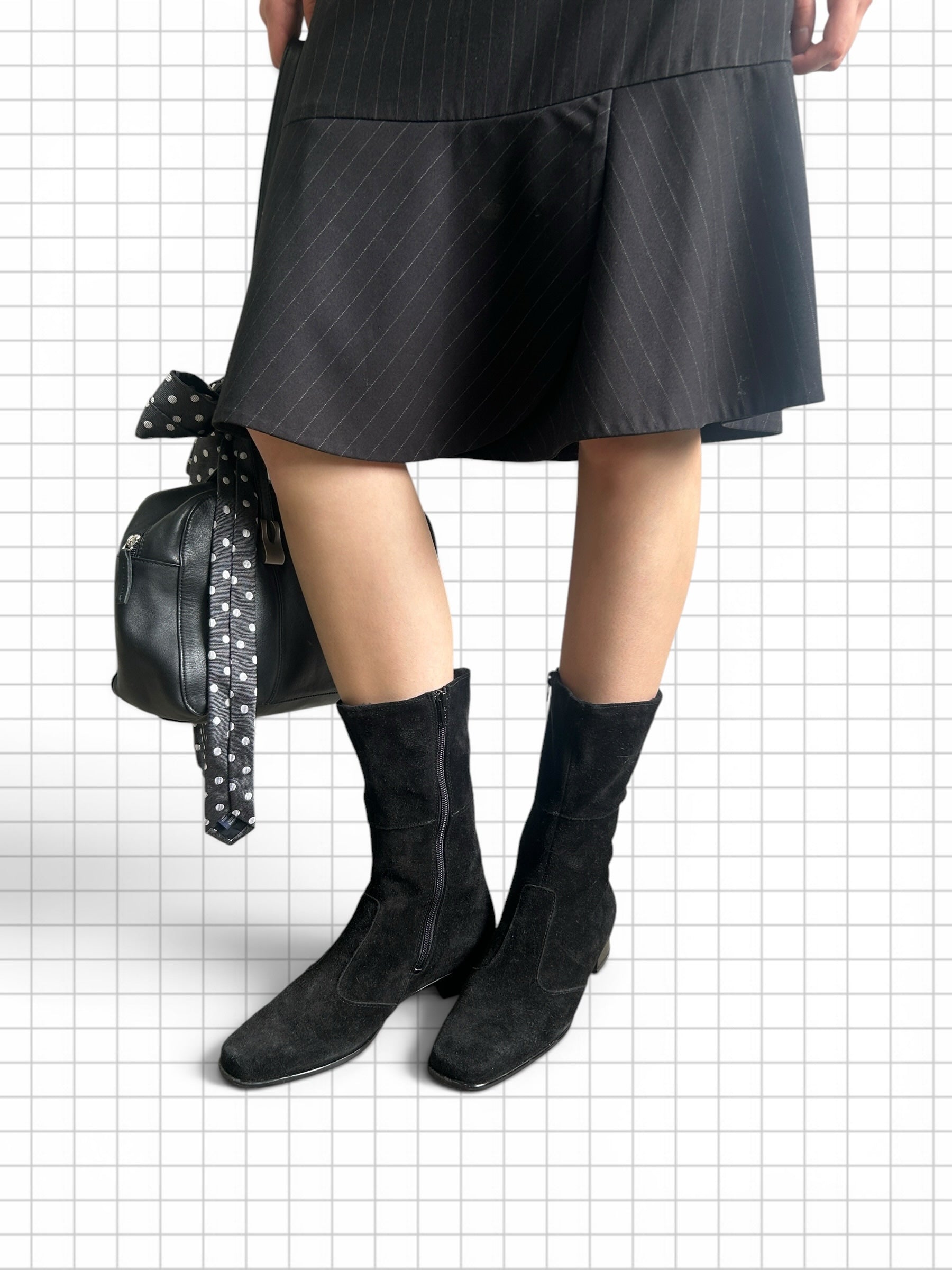 Wieder Wieder black faux suede mid-calf boots with block heel and side zipper worn with a pinstripe skirt