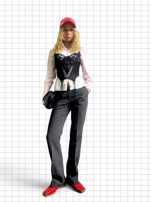 Wieder Wieder charcoal grey tailored straight-leg trousers worn by a model with a black lace corset and pink shirt