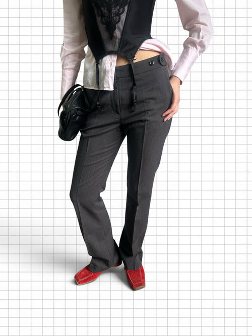 Wieder Wieder charcoal grey tailored straight leg trousers with pressed creases and button closure on a model