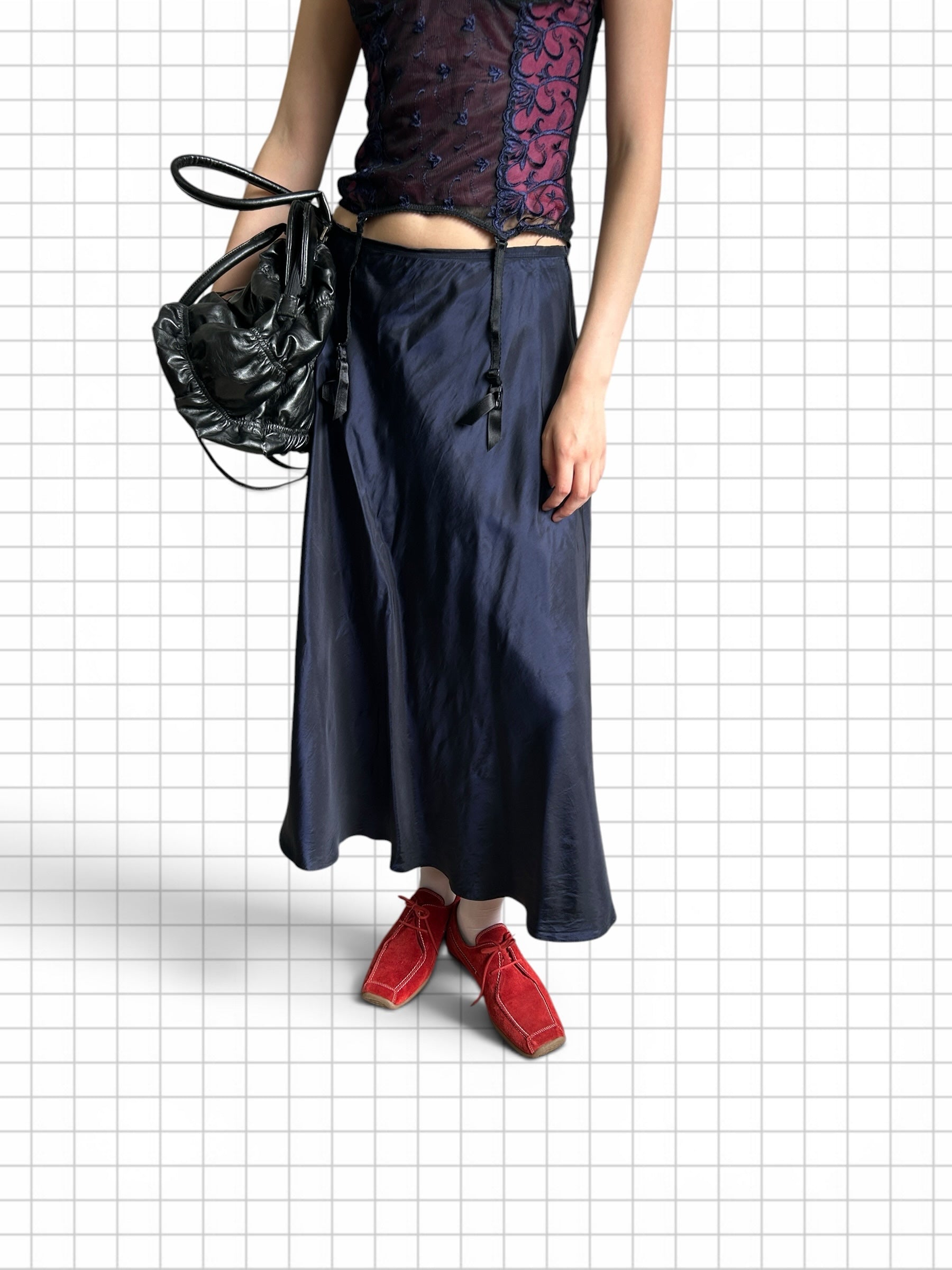 Wieder Wieder elegant dark blue satin midi skirt with attached suspender straps worn with red suede shoes