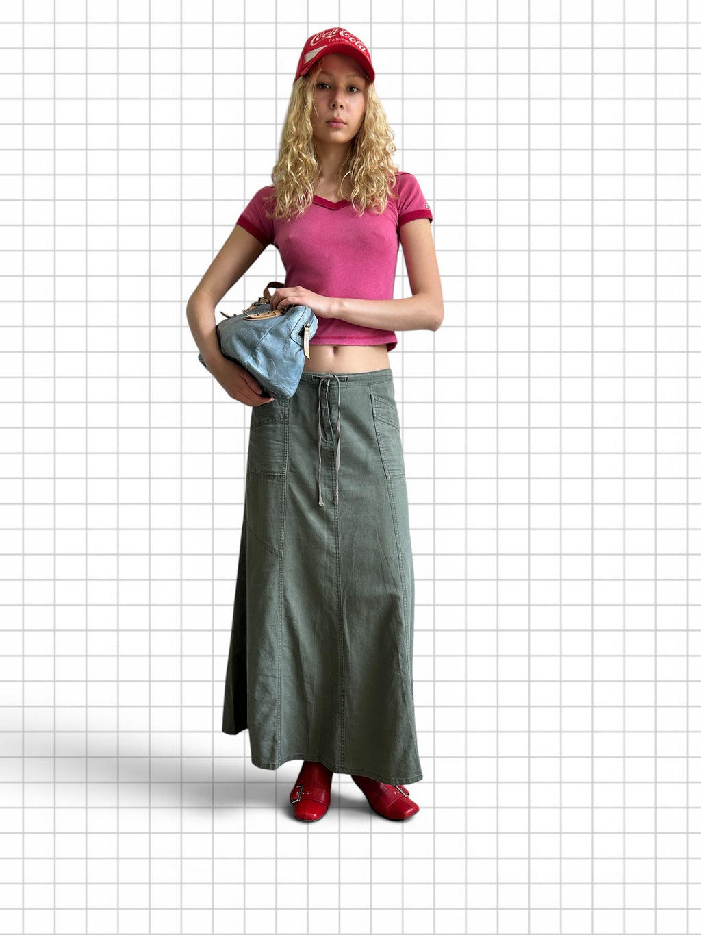 Wieder Wieder olive green cotton maxi skirt with drawstring waist and side pockets worn by a model