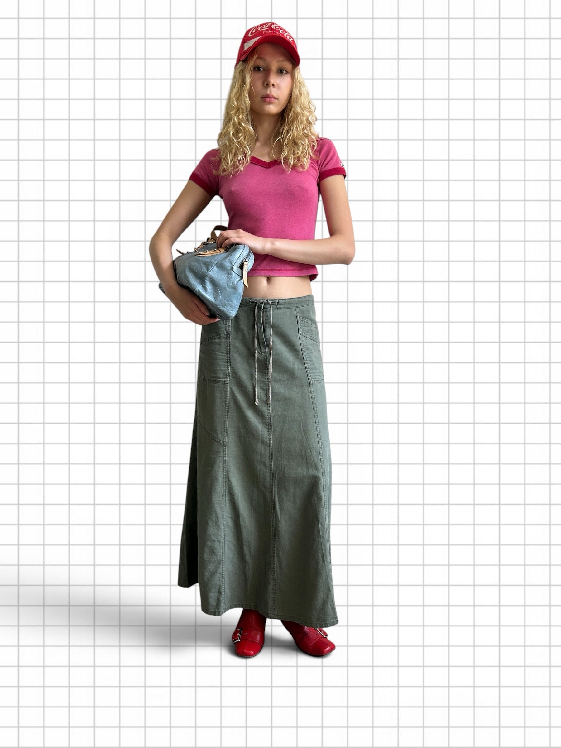 Wieder Wieder olive green cotton maxi skirt with drawstring waist and side pockets worn by a model