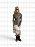 Wieder Wieder olive utility jacket with chest embroidery, mandarin collar, and drawstring waist worn with midi skirt