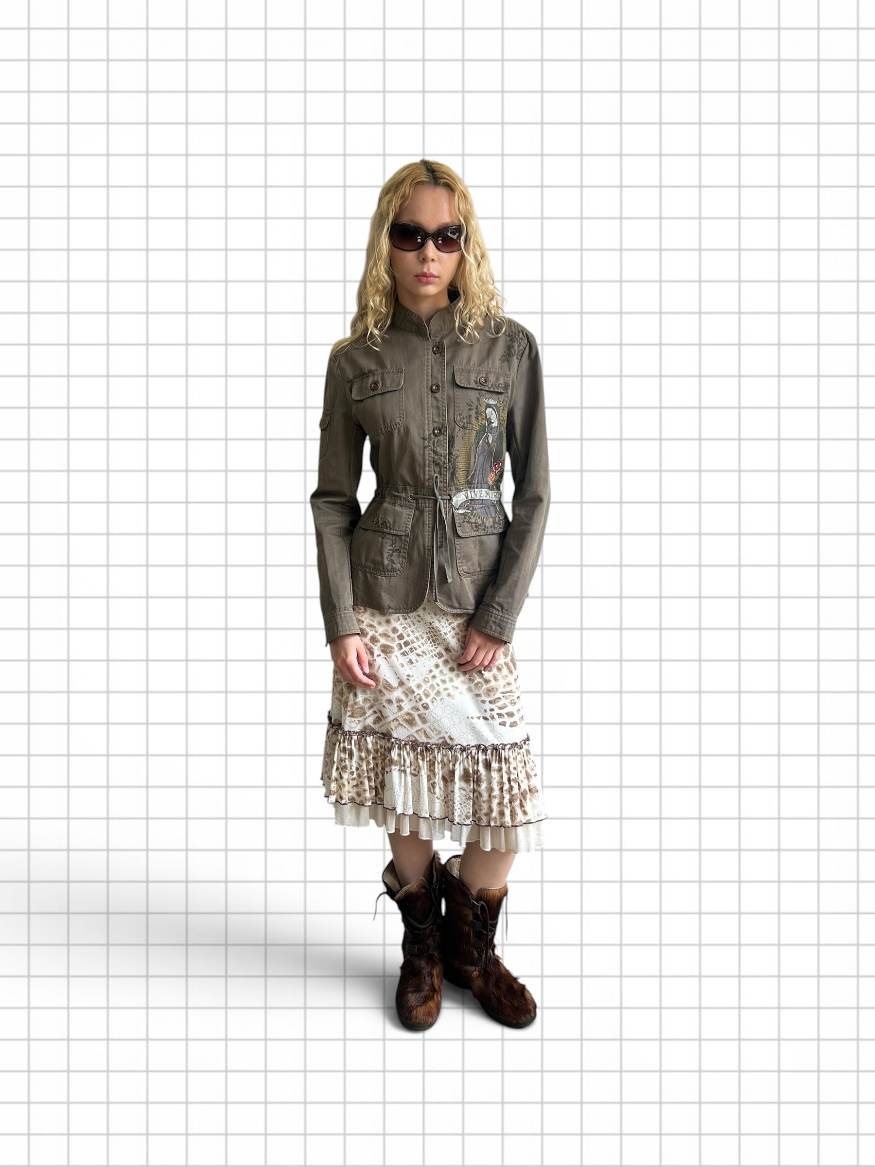 Wieder Wieder olive utility jacket with chest embroidery, mandarin collar, and drawstring waist worn with midi skirt